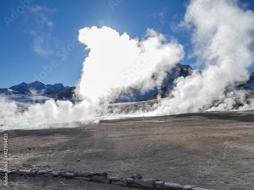 Geyser del Tatio, Atacama Desert, Chile : Geyser in the morning erupting activity in the Geysers del Tatio field in the Atacama Desert, Chile.