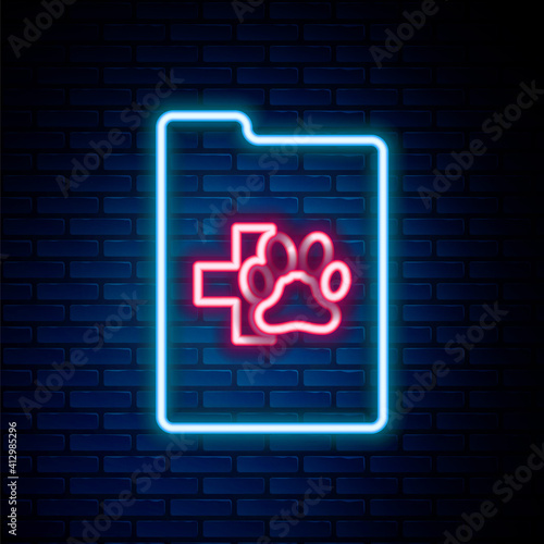 Glowing neon line Clipboard with medical clinical record pet icon isolated on brick wall background. Health insurance form. Medical check marks report. Colorful outline concept. Vector.