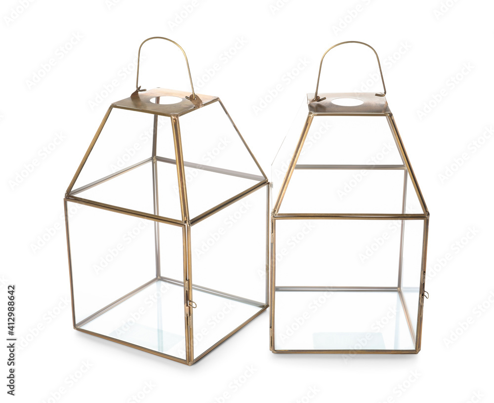 Stylish gold candle holders on white background Stylish gold candle holders on white background