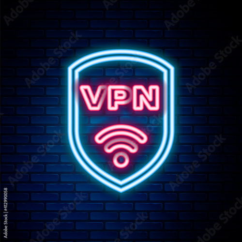 Glowing neon line Shield with VPN and wifi wireless internet network symbol icon isolated on brick wall background. VPN protect safety concept. Colorful outline concept. Vector.
