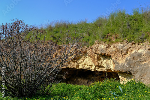 View of a large, deep kurkar sandstone cave in Poleg Nature reserve, located in coastal plain between Herzliya and Netanya, Israel.