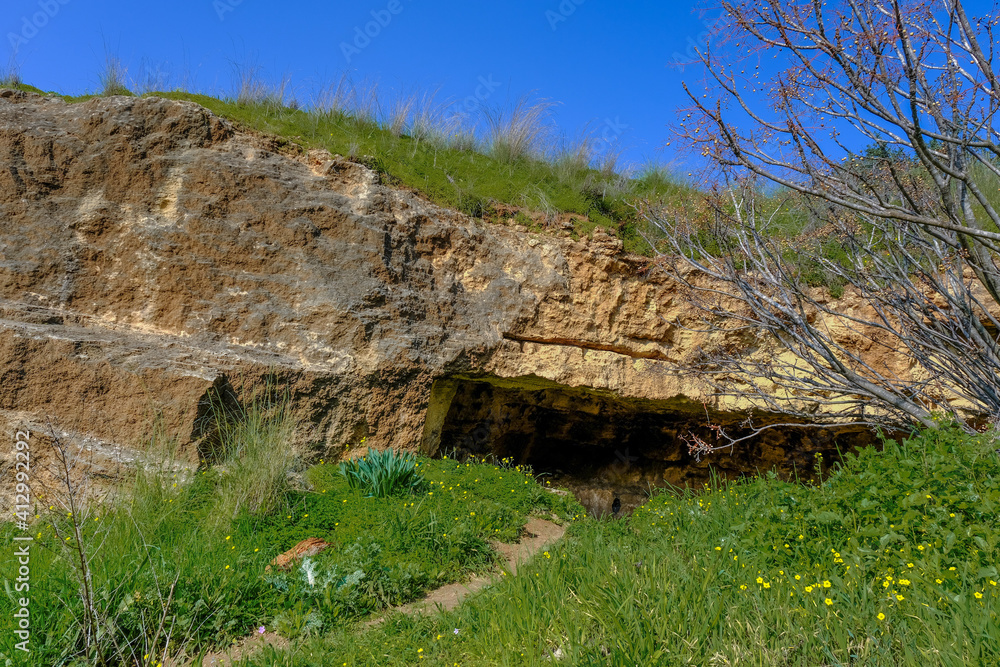 View of a large, deep kurkar sandstone cave in Poleg Nature reserve, located in coastal plain between Herzliya and Netanya, Israel.