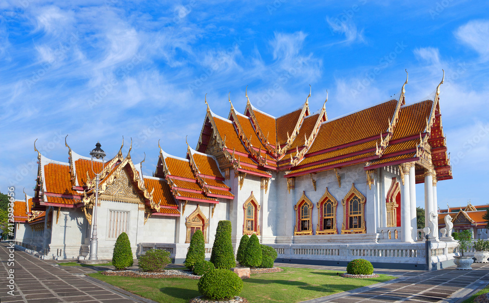 Naklejka premium Panorama of Wat Benchamabophit Dusitvanaram - buddhist Temple in Bangkok, Thailand. Also known as the Marble Temple, it is one of Bangkok's best-known temples and a major tourist attraction