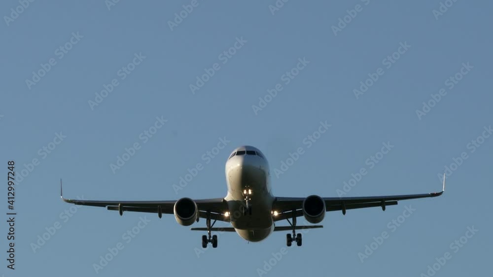 Commercial Airplane Landing at Airport Terminal after International Flight