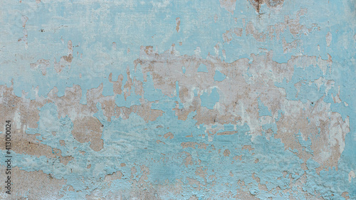 Fototapeta Naklejka Na Ścianę i Meble -  Detail of a portion of the wall. Tears, hiding, graffiti, paint, concrete.
