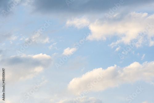 Blue sky with white clouds abstract background or texture.