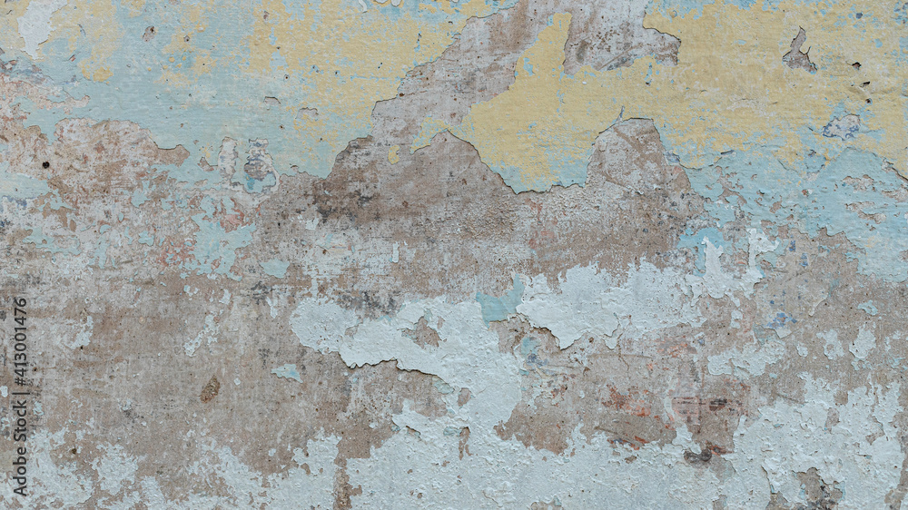 Detail of a portion of the wall. Tears, hiding, graffiti, paint, concrete.