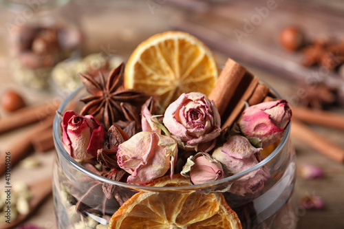 Tableau sur toile Aroma potpourri with different spices in jar, closeup view