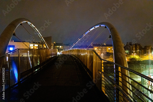 A view of Celtic Gateway bridge, a stainless steel pedestrian and cycle bridge in Anglesey, Wales photo