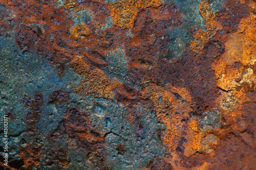 Details of rust and paint on metal.