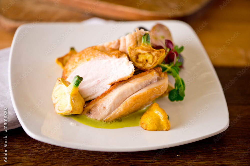 Chicken breast. Chicken pan seared to a crispy golden brown in brown butter and served with fresh organic vegetables: carrots, Brussels sprouts and green beans. Classic American restaurant favorite. Chicken breast. Chicken pan seared to a crispy golden brown in brown butter and served with fresh organic vegetables: carrots, Brussels sprouts and green beans. Classic American restaurant favorite.