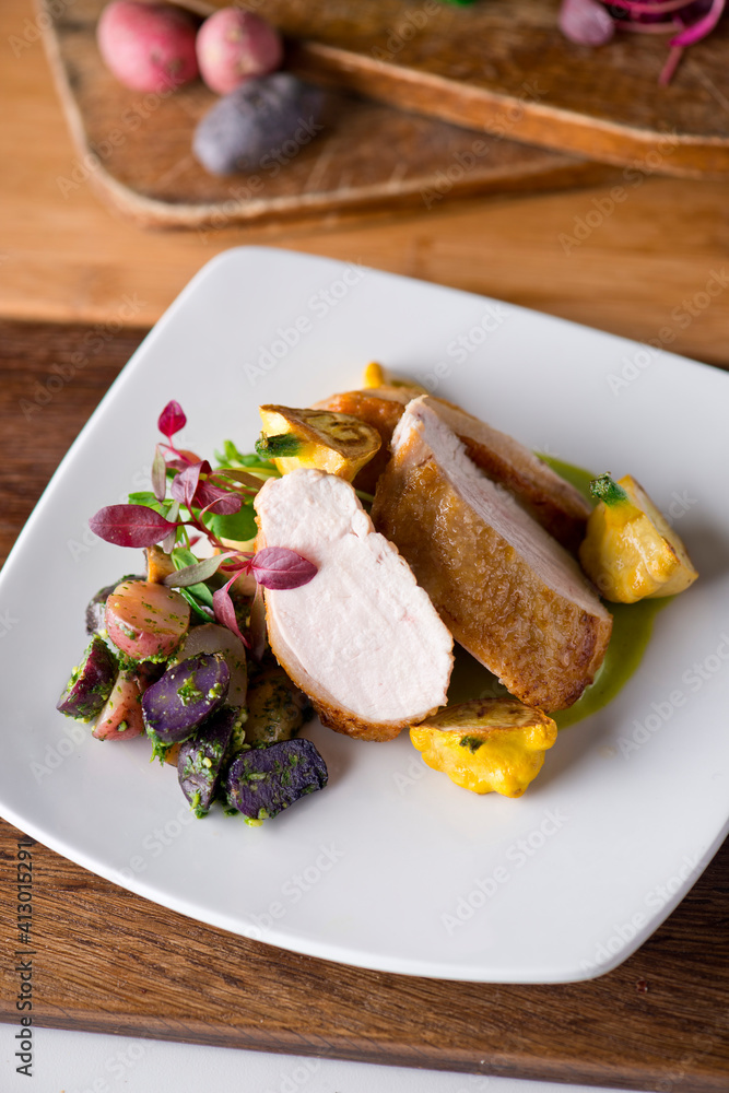 Chicken breast. Chicken pan seared to a crispy golden brown in brown butter and served with fresh organic vegetables: carrots, Brussels sprouts and green beans. Classic American restaurant favorite. Chicken breast. Chicken pan seared to a crispy golden brown in brown butter and served with fresh organic vegetables: carrots, Brussels sprouts and green beans. Classic American restaurant favorite.
