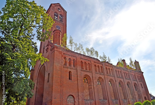 Kirch Darkemen with a bell tower (1842) on a summer day. Ozersk, Kaliningrad region photo