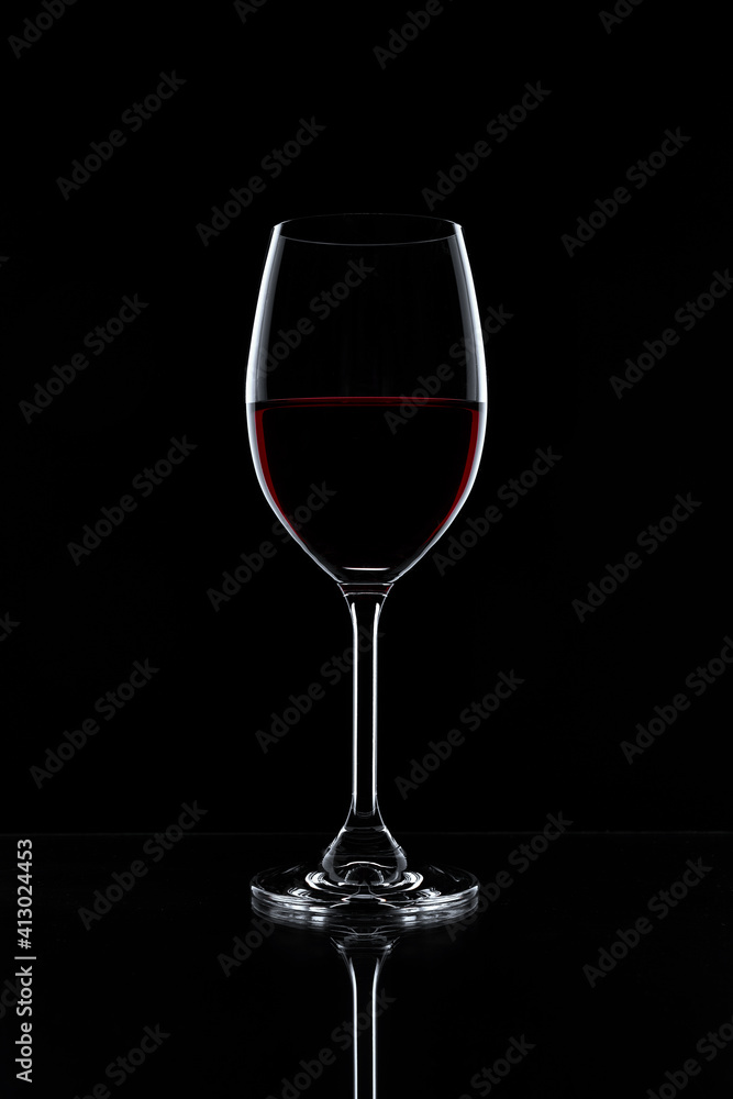 Red wine in a glass isolated on black background - realistic photo image - with clip path Red wine in a glass isolated on black background - realistic photo image - with clip path