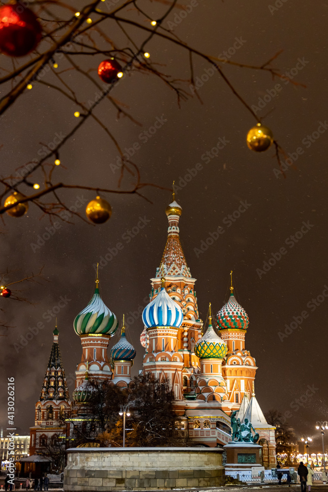 St. Basils cathedral and monument to Minin and Pozharsky on Red Square in Moscow. Winter time with snow. Russian landmark. Moscow, Russia