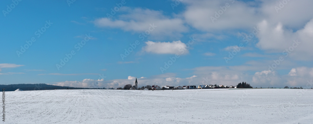 Winter Panorama landscape in agriculture nature with blue sky
