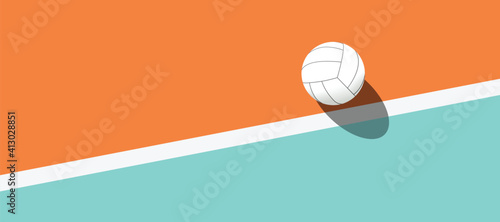 Volleyball court and net visible from the hill angle, volleyball ball standing on the line