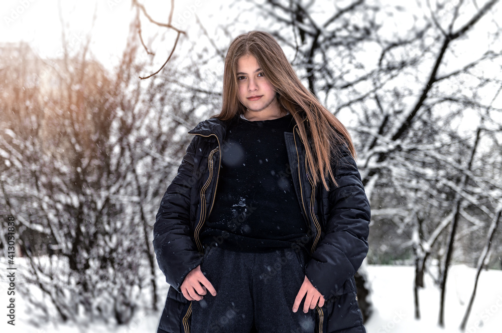 Beautiful sad winter girl portrait. Girl outdoors in winter Beautiful sad winter girl portrait. Girl outdoors in winter
