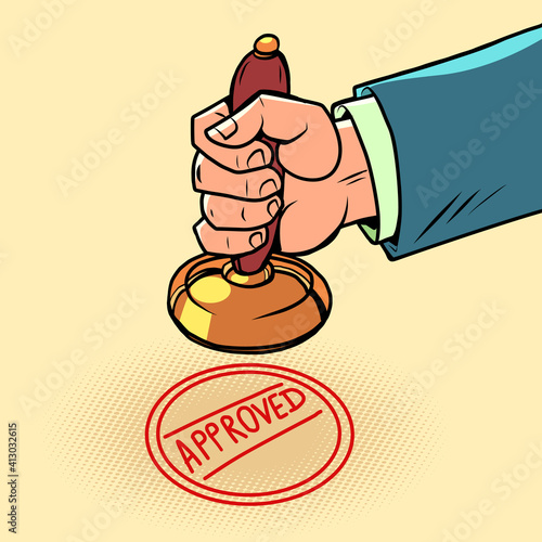 approved hand puts a stamp