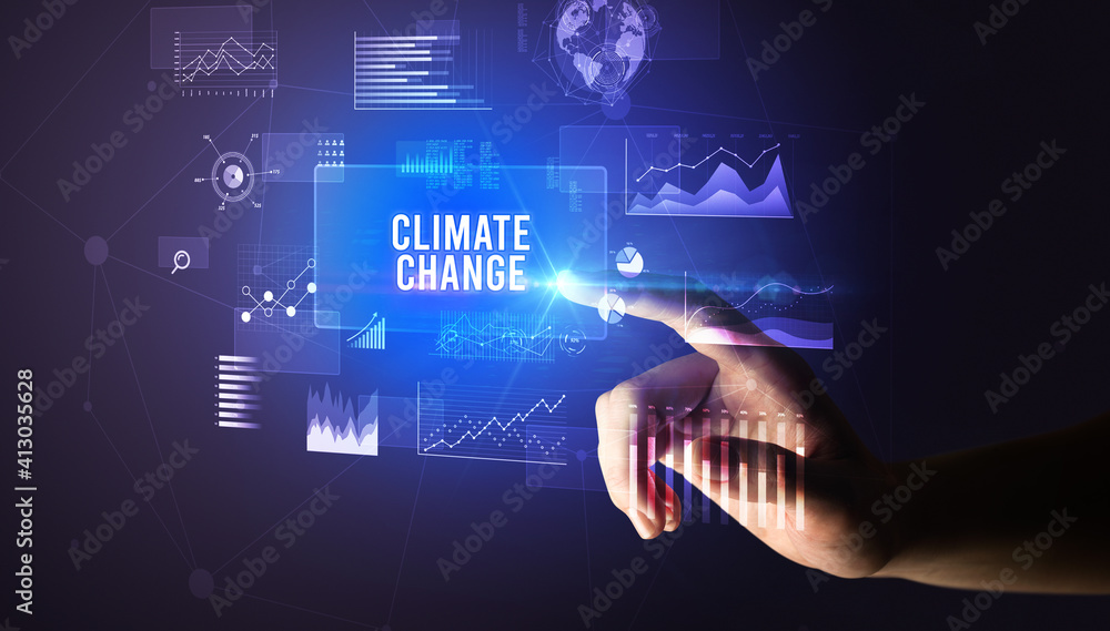 Hand touching CLIMATE CHANGE inscription, new business technology concept Hand touching CLIMATE CHANGE inscription, new business technology concept