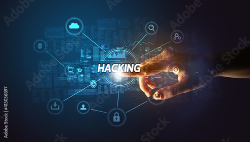 Hand touching HACKING inscription, Cybersecurity concept