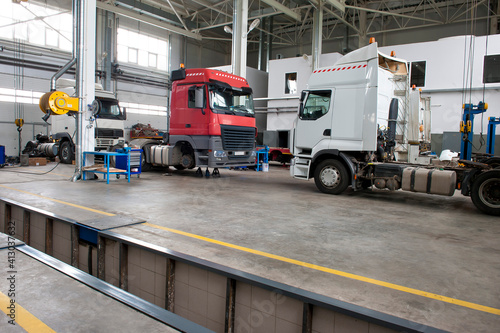Trucks in a car service station. Truck service center