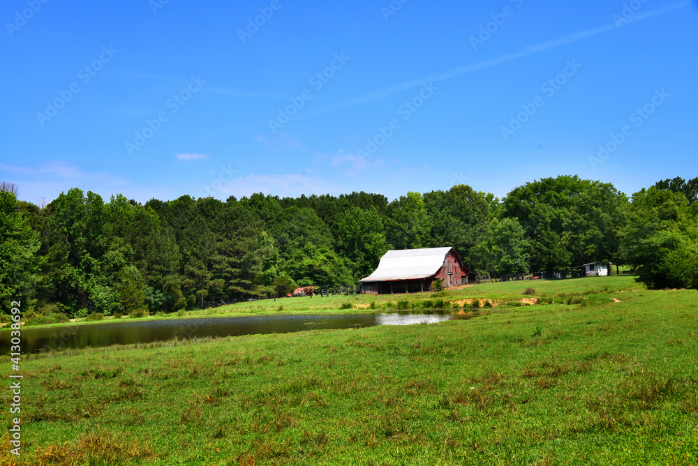 Barn With Pond in Large Field Barn With Pond in Large Field