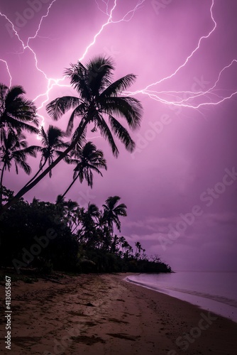 Purple Chain Lightning on a Palm Beach