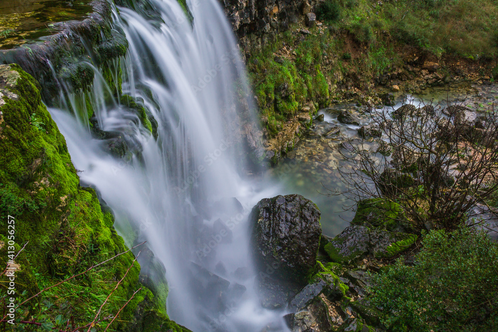 Beautiful waterfall in the mountains of Serra de Aire, Portugal. Long exposure of the waterfall of Fornea in Porto de Mos, Portugal. Beautiful waterfall in the mountains of Serra de Aire, Portugal. Long exposure of the waterfall of Fornea in Porto de Mos, Portugal.