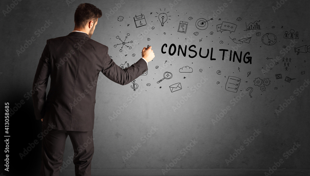 businessman drawing a creative idea sketch with CONSULTING inscription, business strategy concept businessman drawing a creative idea sketch with CONSULTING inscription, business strategy concept