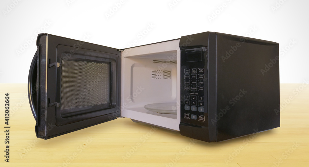 Black Microwave with Door Open on Wooden Countertop Black Microwave with Door Open on Wooden Countertop