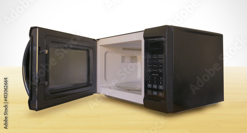 Black Microwave with Door Open on Wooden Countertop