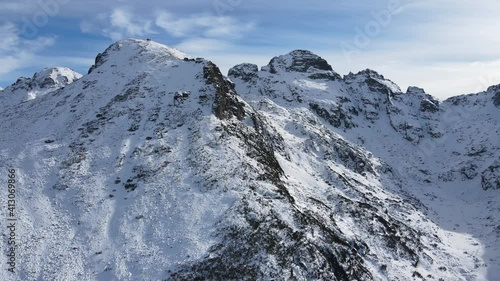 Aerial winter view of Kupens and Orlovets peaks, Rila Mountain, Bulgaria photo