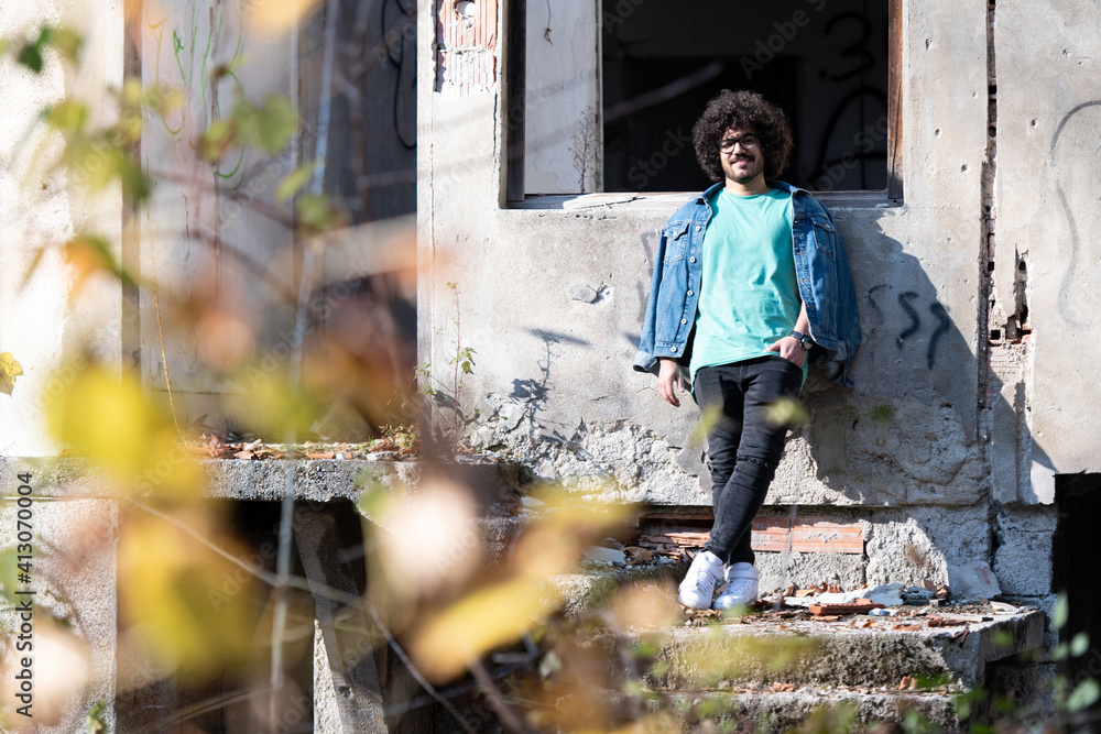 Attractive Man Posing at Ruins Ruined House