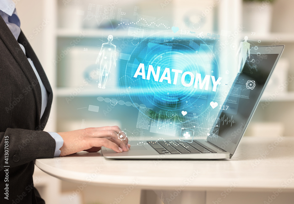 Doctor working a health check with ANATOMY inscription, recording medical test results Doctor working a health check with ANATOMY inscription, recording medical test results