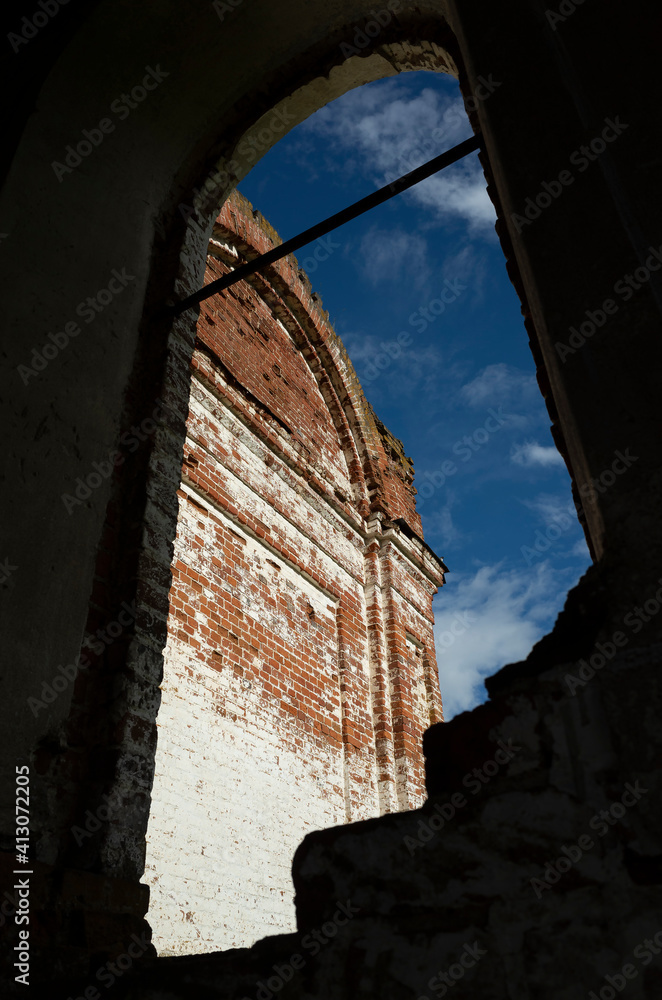 Strict brick walls of the building. Vintage red brick of ruined building