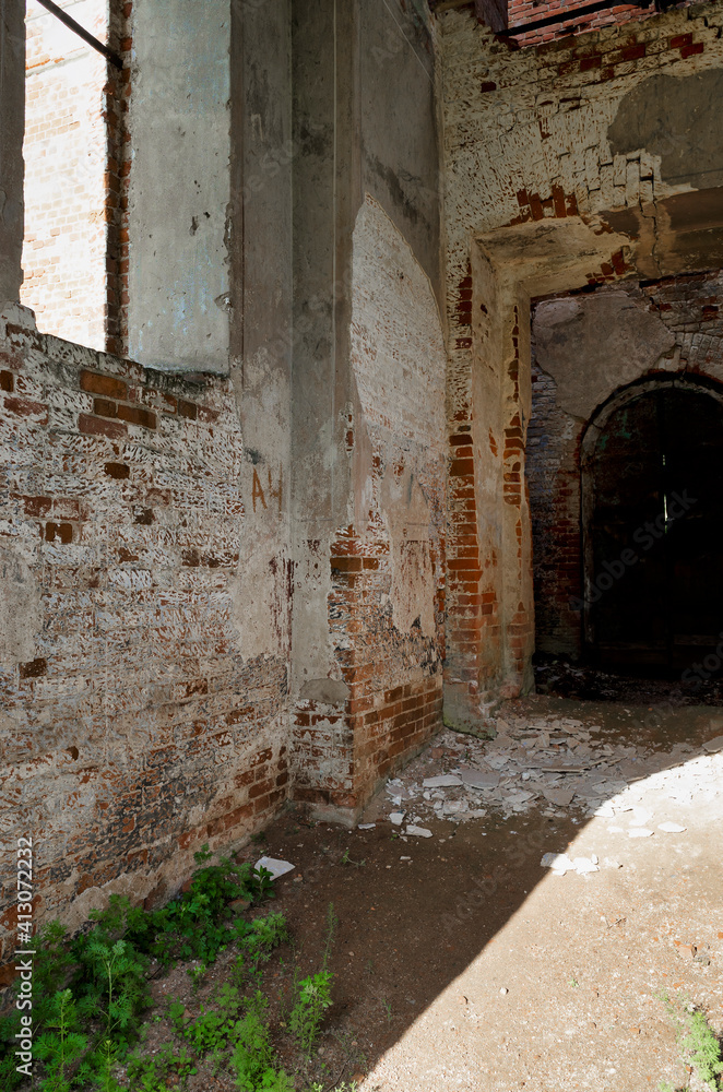 Strict brick walls of the building. Vintage red brick of ruined building