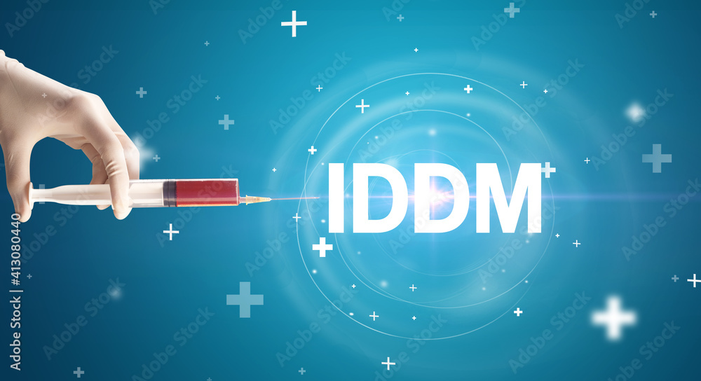 Syringe needle with virus vaccine and IDDM abbreviation, antidote concept Syringe needle with virus vaccine and IDDM abbreviation, antidote concept