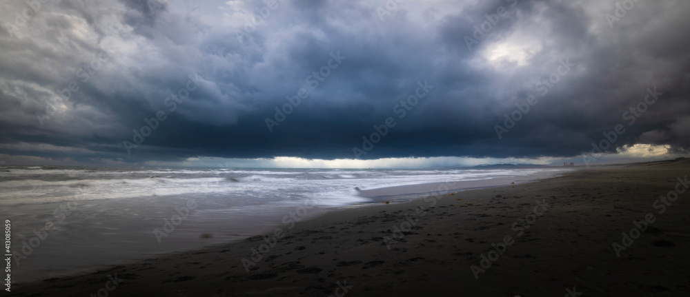 Long exposure shot of dark stormy clouds over the sea in Enoshima, Kanagawa Prefecture, Japan Long exposure shot of dark stormy clouds over the sea in Enoshima, Kanagawa Prefecture, Japan