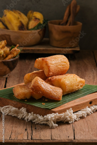 Fried Cassava served on wooden table