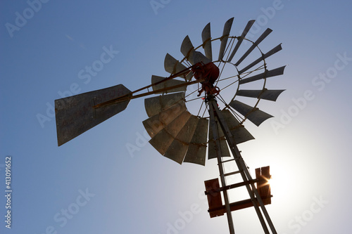 Traditional American farm windmill near Fort Stockton, Texas, USA photo
