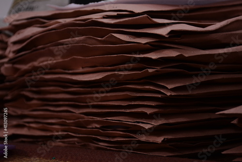 a stack of important documents or brown covers
