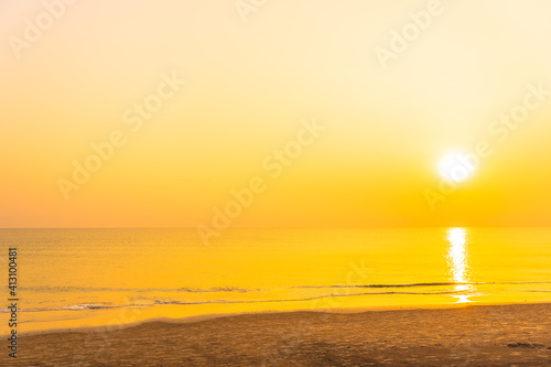 Beautiful tropical beach sea ocean at sunset or sunrise