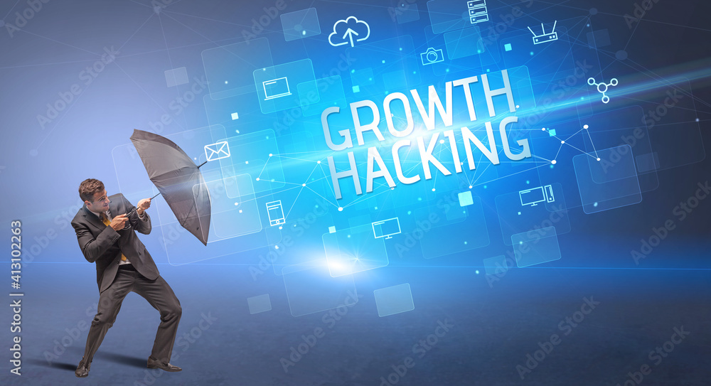 Businessman defending with umbrella from cyber attack and GROWTH HACKING inscription, online security concept Businessman defending with umbrella from cyber attack and GROWTH HACKING inscription, online security concept