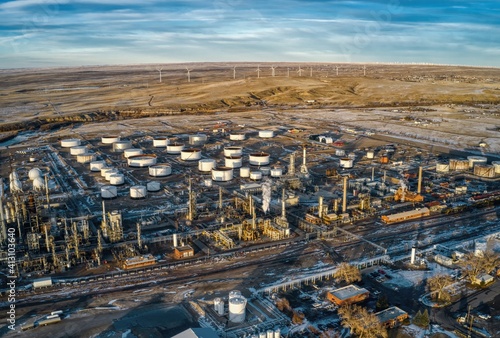 Aerial View of Wind Turbines lurking behind an Oil Refinery in Casper, Wyoming