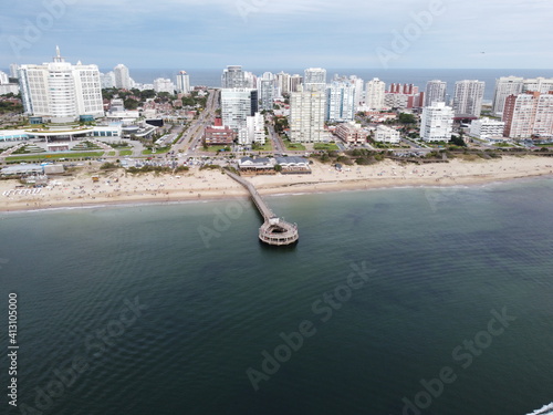 dock at the beach of Playa Mansa, Uruguay photo