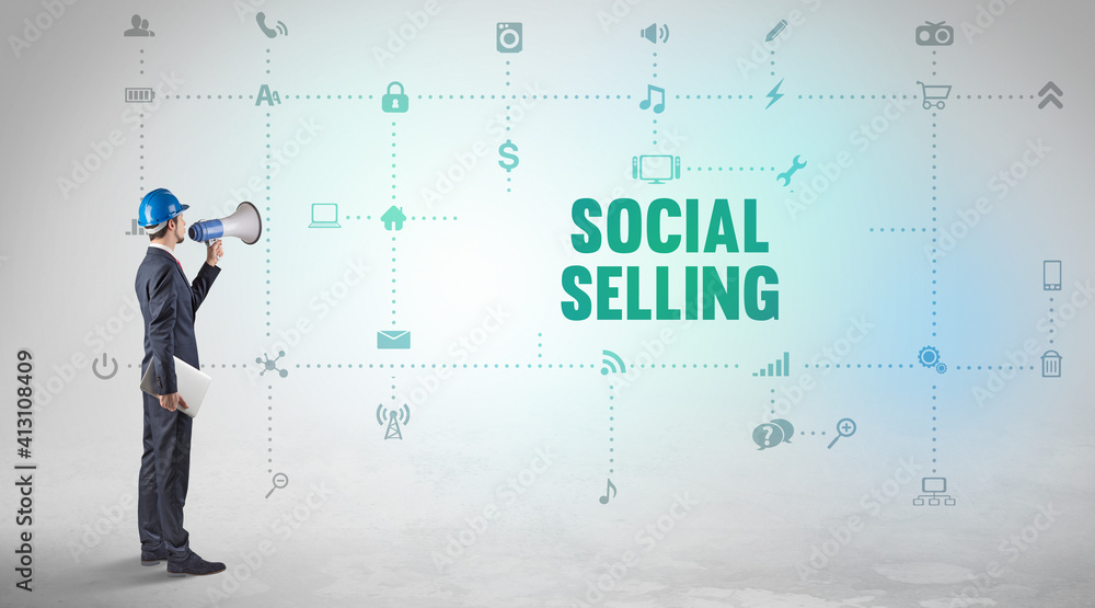 Engineer working on a new social media platform with SOCIAL SELLING inscription concept Engineer working on a new social media platform with SOCIAL SELLING inscription concept