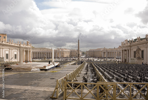 Tourists visiting St. Peter's Square. Workers cleaned area