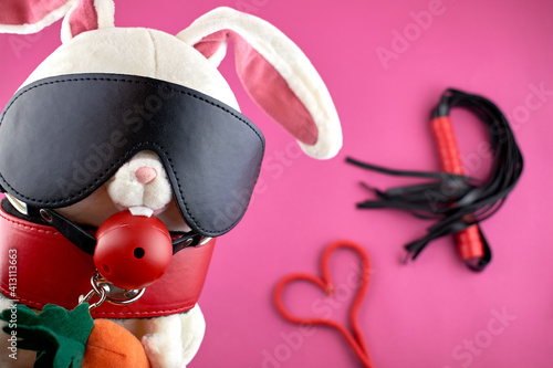Fotografie Toy rabbit dressed in BDMS accessories