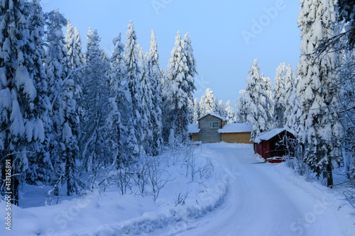 Russia,Republic Of Karelia,Kostomuksha. The road leads to small houses.February, 10.2021. © Людмилa